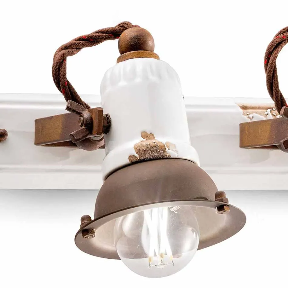 Applique design a tre faretti orientabili in ceramica e metallo Lacey Viadurini