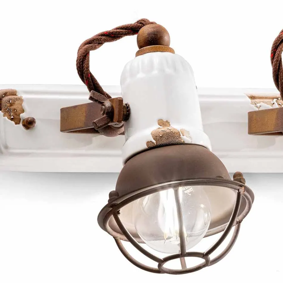 Applique design a tre faretti orientabili in ceramica e metallo Lacey Viadurini