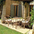 Poltrona per Esterni in Rattan Naturale da Giardino Impilabile - Spora Viadurini