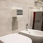 Portarotolo da Bagno in Corian Bianco o con Inserti Neri Design Italiano - Elono Viadurini