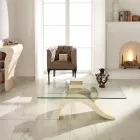 Tavolino Design Moderno con Piano in Vetro e Base Pietra Fossile - Ricarica Viadurini