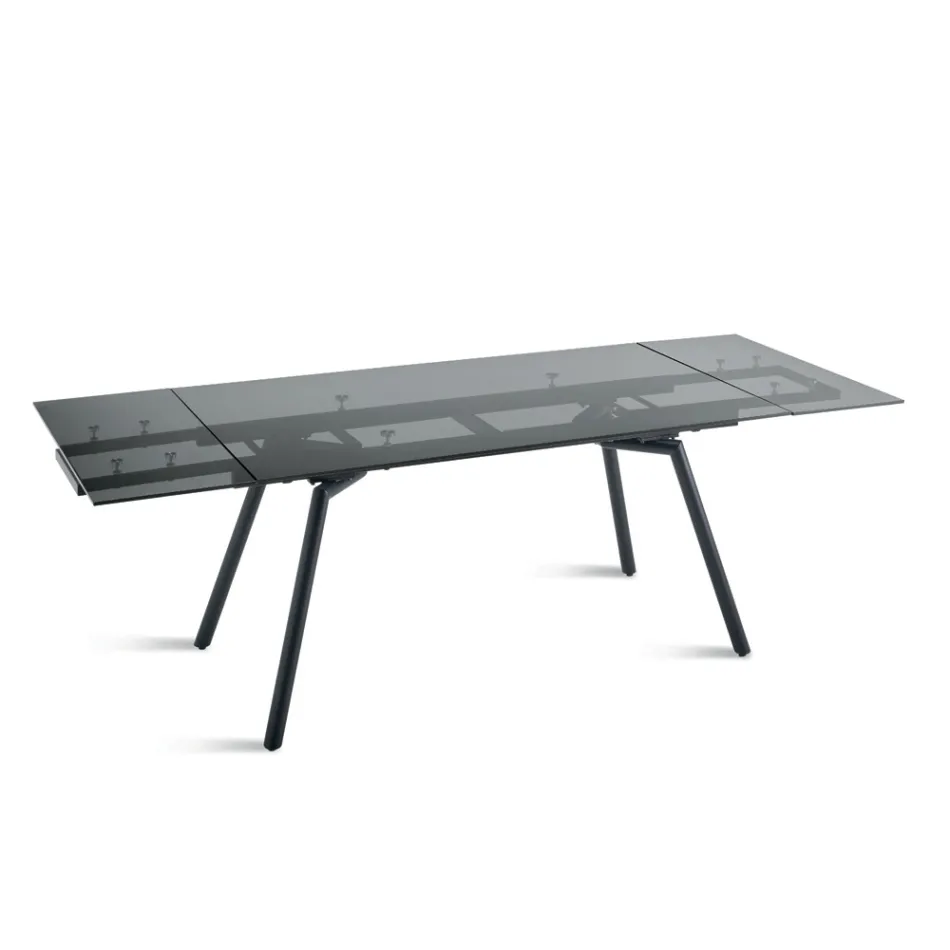 Tavolo Allungabile 160/240x91 cm in Vetro Fumè e Base in Metallo Nero - Colonna Viadurini