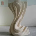 Tavolo da pranzo rotondo in pietra con piano in cristallo Cadmo Viadurini