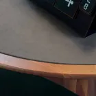 Tavolo rotondo con piano in legno massello di noce naturale, Carlo Viadurini